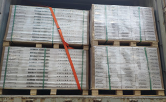 Flooring pallets loaded in container.jpg